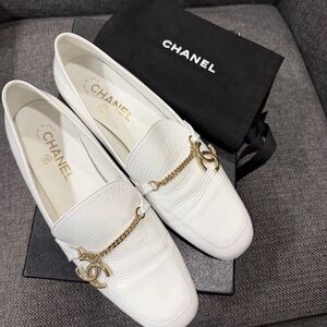 CHANEL White Flats with Gold Chain Accent